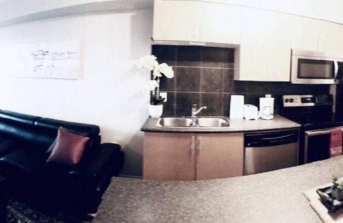 Downtown Edmonton Condo | ICE District 2BDRM A/C Condo W/Laundry + U/Parking
