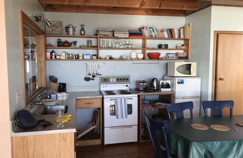Waikanae House | Iconic absolute beachfront 60s bach