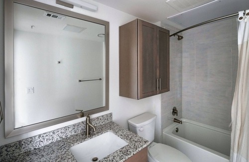Waller Creek District Apartment | Ideal Downtown 1BR w/Deck & Gym, nr Convention Center, by Blueground