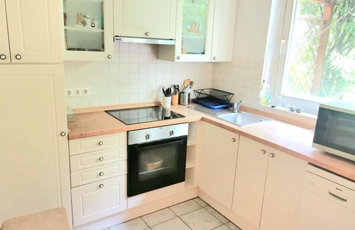 Budavar Apartment | Idyllic Apartment w/a Private Patio and Huge Communal Garden! (Pet-Friendly)