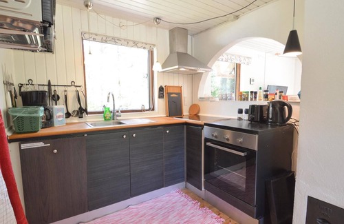 Lundby House | Idyllic thatched cottage in green surroundings in South Zealand.