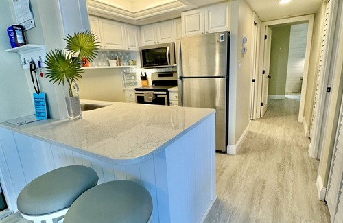Siesta Key Condo | If you’re looking for a professionally decorated bright and airy this is it!