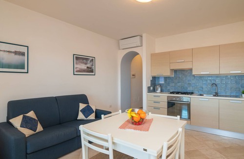 Porto Pozzo Apartment | Il Fjordo bilo (PPZ160) by Interhome