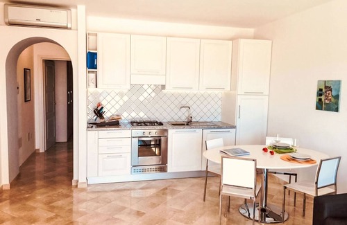 Porto Pozzo Apartment | Il Fjordo bilo terrazzo (PPZ162) by Interhome