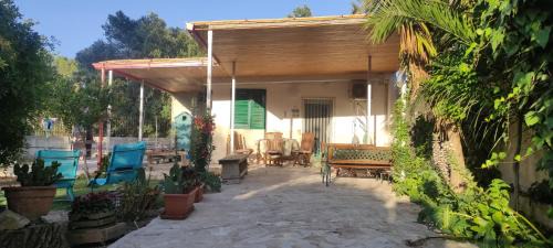 Taranto House | Il giardino di zio Pino