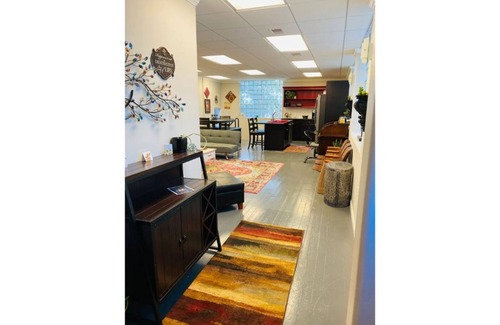 Sedalia Villa | Immaculately Remodeled Historic building and Greenhouse with fire pit