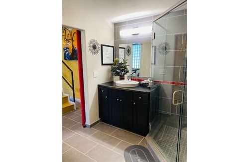 Sedalia Villa | Immaculately Remodeled Historic building and Greenhouse with fire pit