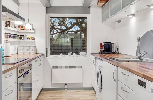 Strandby House | In the 1st row of dunes and with sea view to the Kattegat, this bright and cozy vacation home in Str