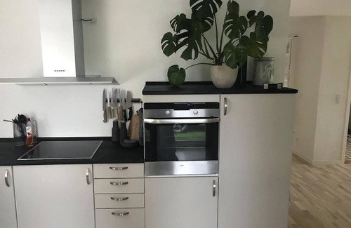 Rageleje House | In the charming coastal town of Rågeleje, this lovely holiday home is located.