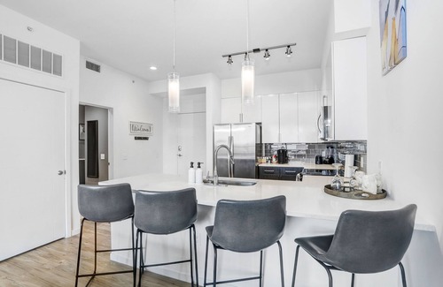 Channel District Apartment | Includes access to top of the line Gym, Luxary Pool, & City View Sky Lounge