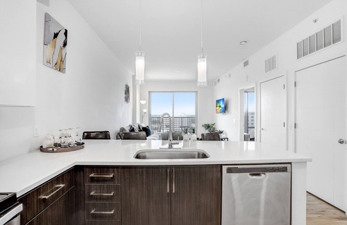 Channel District Apartment | Includes access to top of the line Gym, Luxary Pool, & City View Sky Lounge