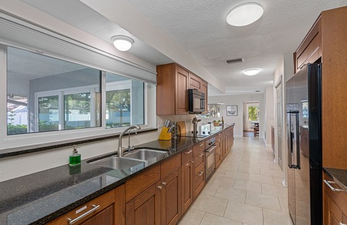 Clearwater House | Incredible Heated & Salt Water Pool Home w/Many Amenities by Emperor Rentals