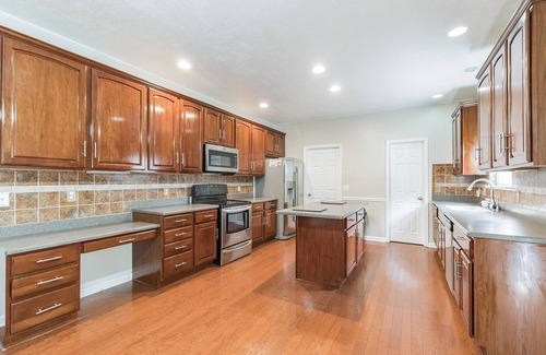 Westfield House | Incredibly Spacious Carmel Home With Fully Equipped Kitchen - 4700 Sq Ft! Sleeps 15! Pet Friendly! 6 Bedroom Home by RedAwning