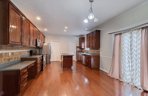 Westfield House | Incredibly Spacious Carmel Home With Fully Equipped Kitchen - 4700 Sq Ft! Sleeps 15! Pet Friendly! 6 Bedroom Home by RedAwning