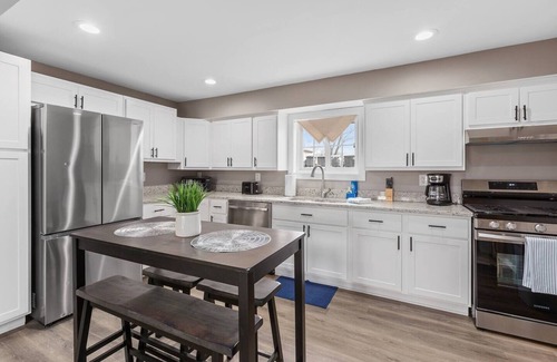 Portage House | Indiana Dunes Portage Duplex with view of the water