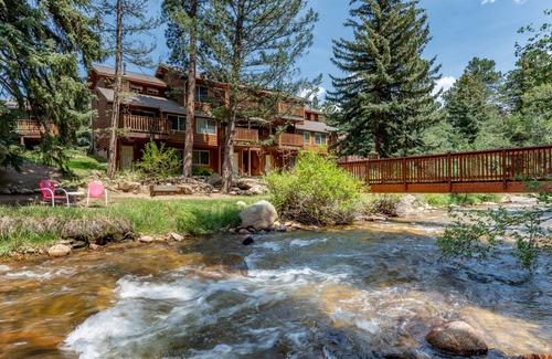Estes Park Condo | Indulge in the unparalleled comfort of the Riverview Suite End Unit.