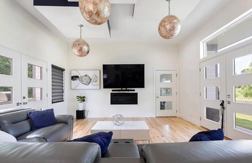 Council Bluffs House | Industrialized Modernly Designed Upscale Retreat
