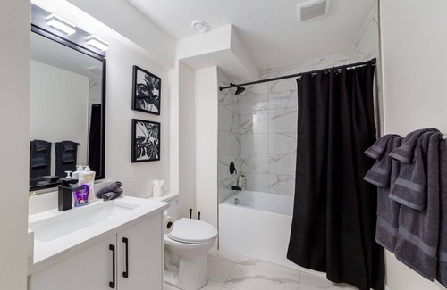 Chestermere Apartment | "Inky & Rose" Stylish Two Bedroom Lower Suite