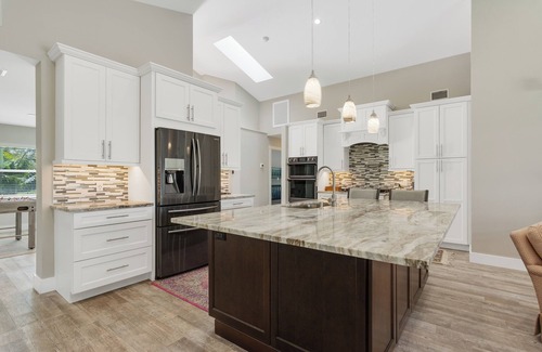 Interchange Square House | Intercoastal Oasis Heated Pool & Dock in peaceful Vero Beach!