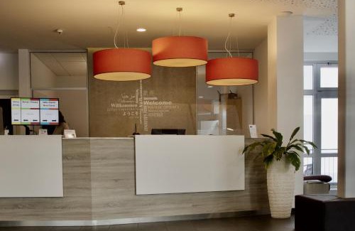Burbach Hotel | Internationales Tagungszentrum Karimu