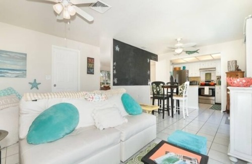 Oakland Hills House | Introducing Caddy Shack,the perfect abode for your short-term stay. This delightful 2 bed, 2 bath canal home has been thoughtfully remodeled to exude a beachy atmosphere