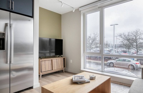 Boston Apartment | Inviting Brighton Jr 1BR w/Gym & W/D, on the River, by Blueground