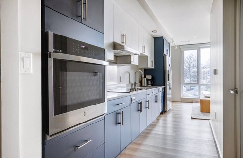 Boston Apartment | Inviting Brighton Jr 1BR w/Gym & W/D, on the River, by Blueground