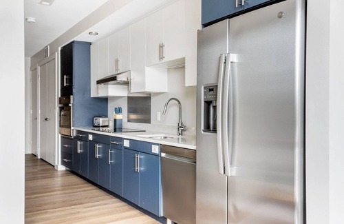 Boston Apartment | Inviting Brighton Jr 1BR w/Gym & W/D, on the River, by Blueground