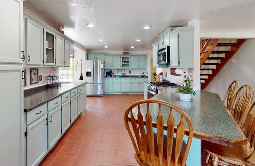 Palisade House | Inviting dog-friendly home with hot tub, full kitchen, grill, & W/D