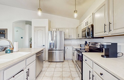 Foothills House | Inviting home with pool, hot tub, enclosed yard, fast WiFi, & W/D