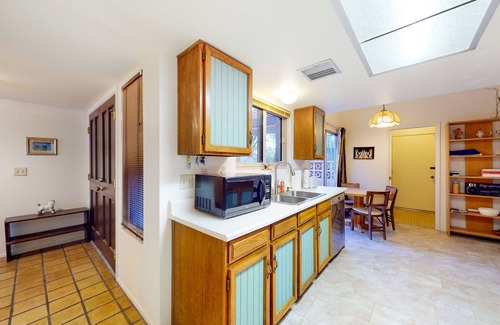 The Foothills Townhomes House | Inviting townhouse with pool, enclosed yard, patio, mountain view & W/D