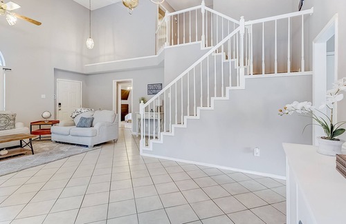 Dallas House | Inviting, two-story home on a large lot with a private pool, gas fireplace, & AC