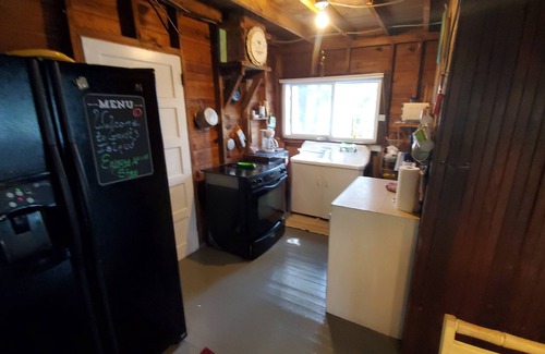 Brantingham Cottage | Island Cottage sleeps 8, dogs run free, Pontoon Boat, Hottub. Featured on ABC