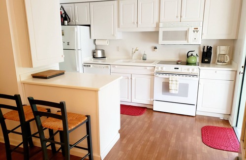 Chincoteague House | Island Escape - Townhouse - Enclosed back porch. NO LINENS