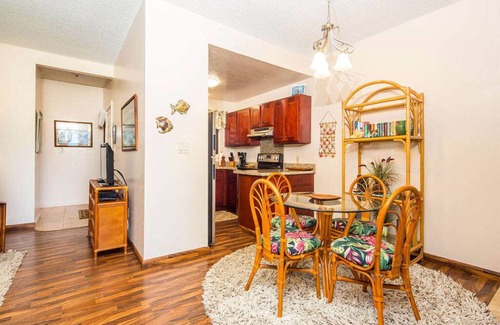 Lihue Condo | Island Touches w/Modern Kitchen, Wood Floors, Lanai, Flat Screen, WiFi–Kaha Lani 203