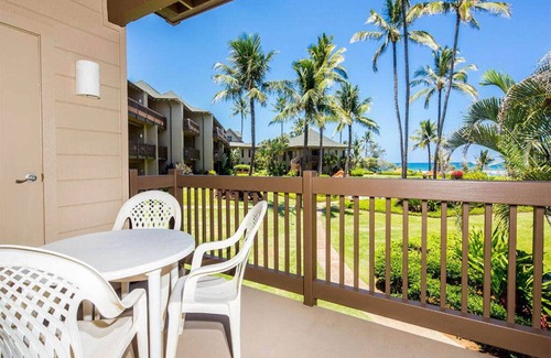 Lihue Condo | Island Touches w/Modern Kitchen, Wood Floors, Lanai, Flat Screen, WiFi–Kaha Lani 203