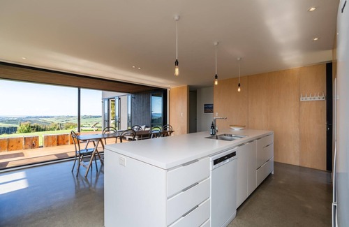 Mangawhai House | Island View - Designer holiday home with fabulous indoor outdoor living and spectacular views