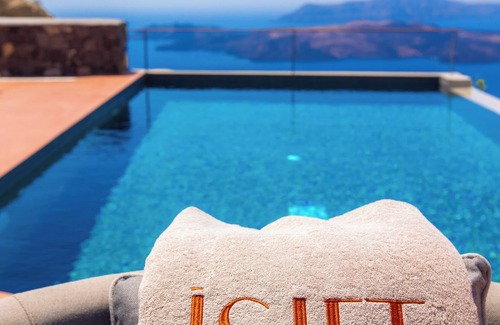 Vourvoulos Villa | Islet Santorini Retreat: Infinity Caldera Views