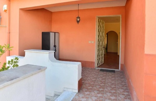 Villaggio del Pino-Le Ginestre House | Villa Cinzia - Appartamento con Vista Giardino