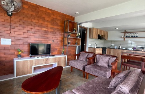 Pirmed Villa | IZZAT INN Villa, Parunthumpara, A pet friendly mountien view villa.