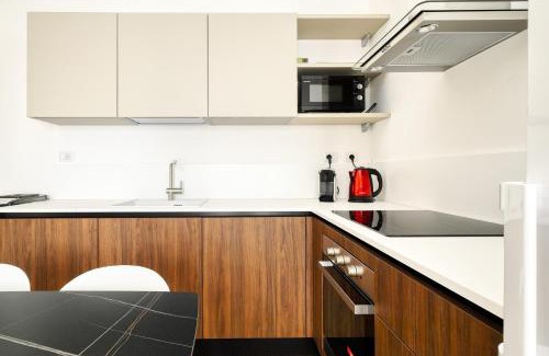 Gorla Apartment | JOIVY 1-Bed apartment with balcony near subway