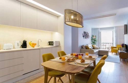 Chiado Apartment | JOIVY Sunny 1-bed flat w/terrace&sea view in Baixa,3mins to Arco da Rua Augusta