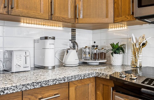 Central Okanagan Condo | Joy's Chic Suite | 2 BR w Hot Tub & Sunrise Mountain View!