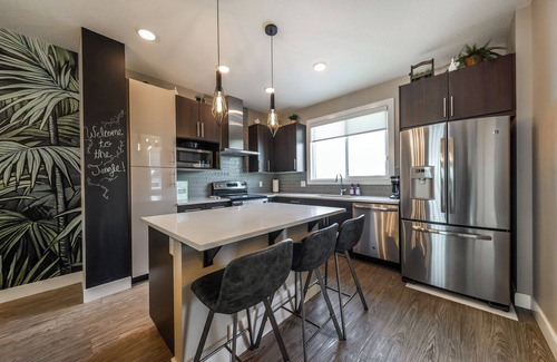 Southeast Edmonton House | Jungle Themed Home for a Family Getaway Adventure