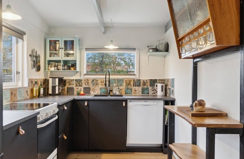 Store Fuglede House | Just a short walk from the sandy beach, this practical vacation home welcomes you.
