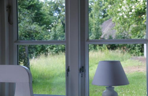 Bielenberg House | Kate unter Reet im Grünen