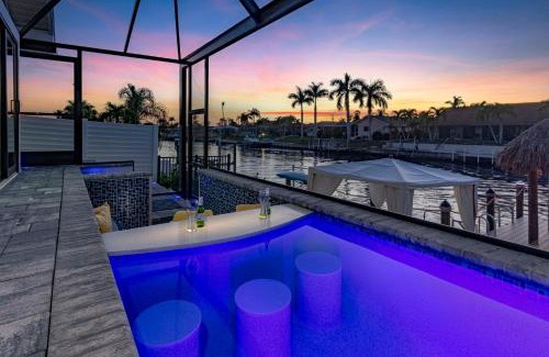 Cape Coral House | Kayaks, Boat Dock, Heated Pool & Spa, Outside Kitchen, Tiki Hut - Villa Pedro - Roelens Vacations
