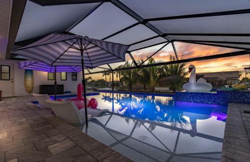Cape Coral House | Kayaks, Boat Dock, Heated Pool & Spa, Outside Kitchen, Tiki Hut - Villa Pedro - Roelens Vacations