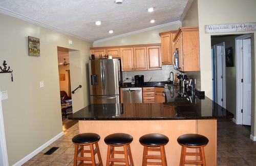 Guntersville House | Keepin' It Reel. 4 BR waterfront home with 2 slip boathouse
