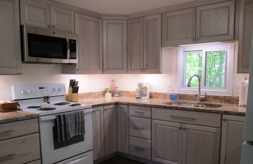 Kelleys Island House | "Kelleys Island Escape" is a short walk from downtown Kelleys Island & sleeps 6.